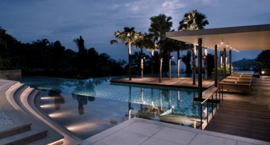 House with pool at night